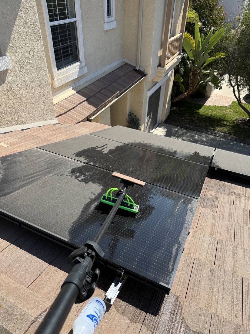 Clean solar panels reflecting the sky