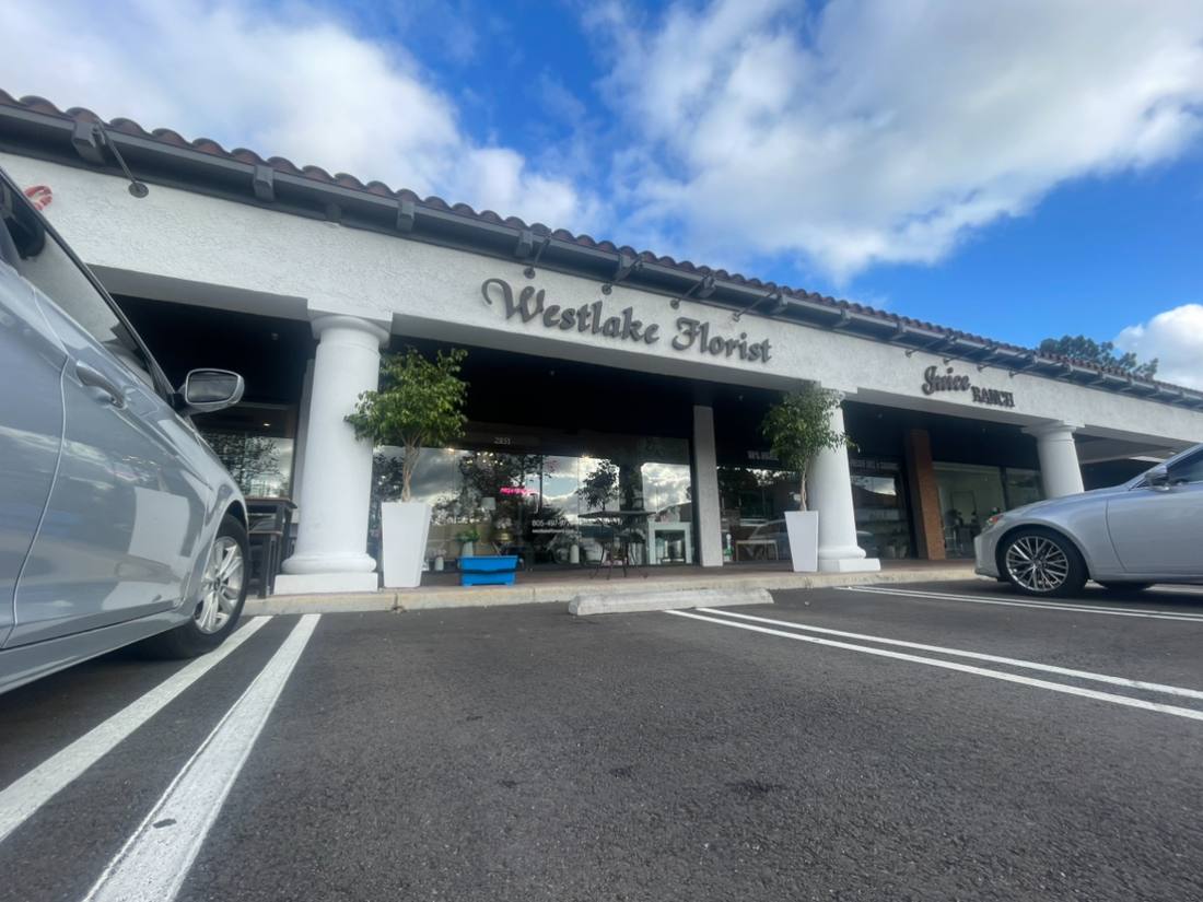 Storefront glass cleaned at a Westlake Village shopping center